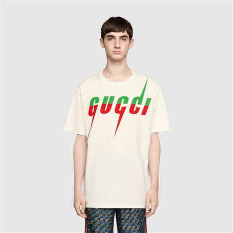 maglia gucci bianca con scritta|T.